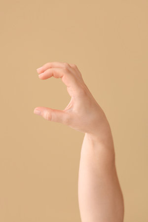 Hand showing letter C on color background. Sign language alphabetの写真素材