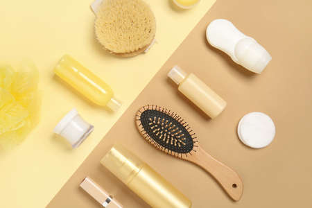 Travel cosmetics kit on color background
