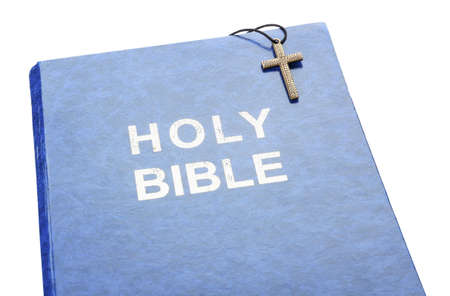 Holy Bible and cross on white background
