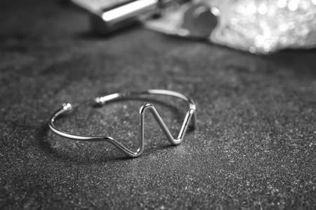 Beautiful silver bracelet on dark backgroundの写真素材