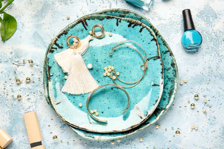 Beautiful composition with jewelry on color backgroundの写真素材