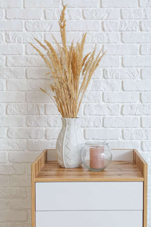 Modern chest of drawers in interior of roomの写真素材