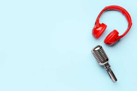 Headphones with microphone on color backgroundの写真素材