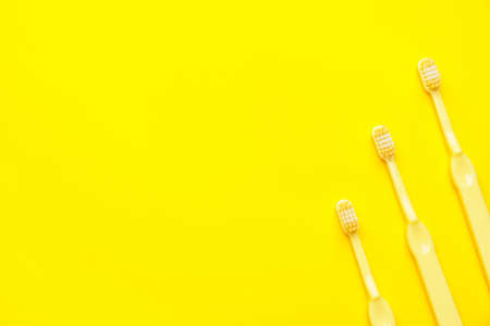 Toothbrushes on color backgroundの写真素材