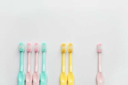 Toothbrushes on light backgroundの写真素材