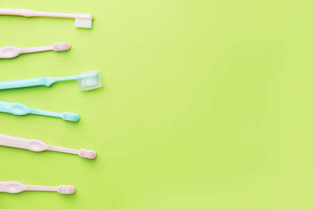 Toothbrushes on color backgroundの写真素材