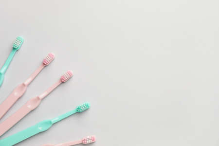 Toothbrushes on light backgroundの写真素材