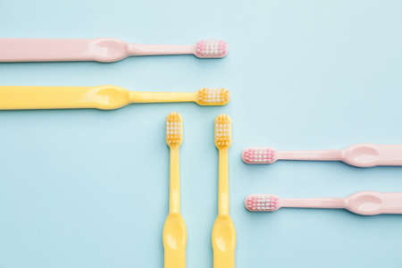 Toothbrushes on color backgroundの写真素材
