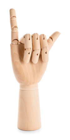 Wooden hand showing letter U on white background. Sign language alphabetの写真素材