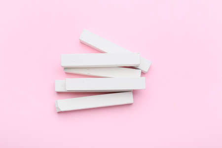 White chalks on color backgroundの写真素材