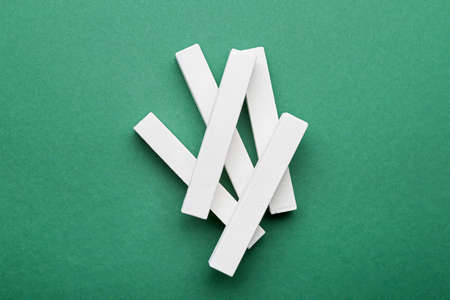 White chalks on color backgroundの写真素材