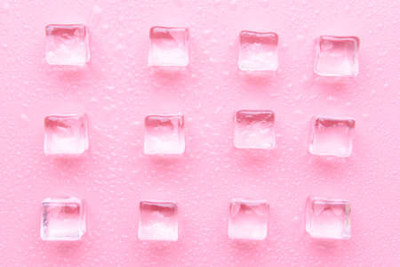 Ice cubes on color background