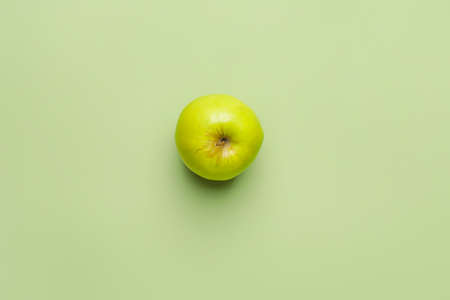 Fresh apple on color backgroundの写真素材
