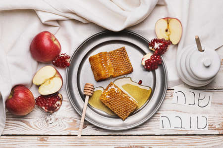 Composition for Rosh Hashanah (Jewish New Year) celebration on wooden backgroundの写真素材