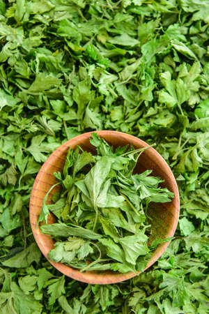 Bowl with heap of dry parsleyの写真素材
