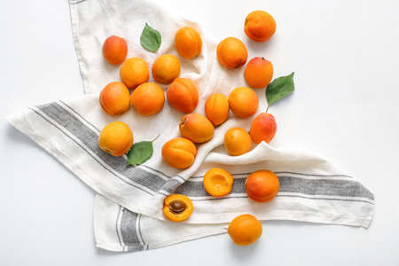 Tasty ripe apricots on white backgroundの写真素材