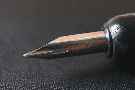 Fountain pen on dark background