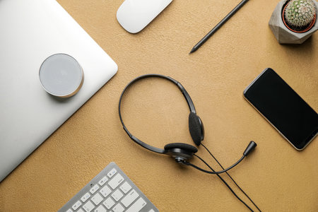 Headset with modern devices on color background