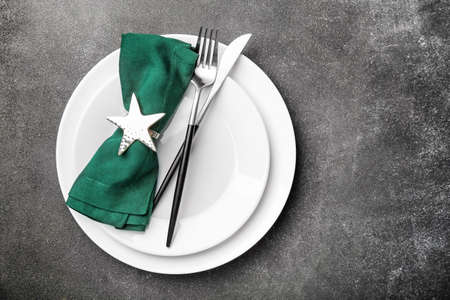 Beautiful table setting on dark backgroundの写真素材