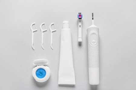 Set for oral hygiene on light background