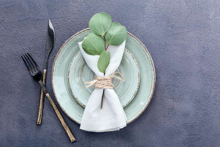 Beautiful table setting on dark background