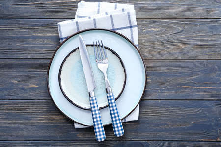 Simple table setting on wooden backgroundの写真素材
