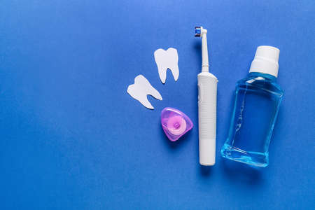 Set for oral hygiene on color background