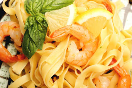 Plate of tasty pasta with shrimps, closeupの写真素材