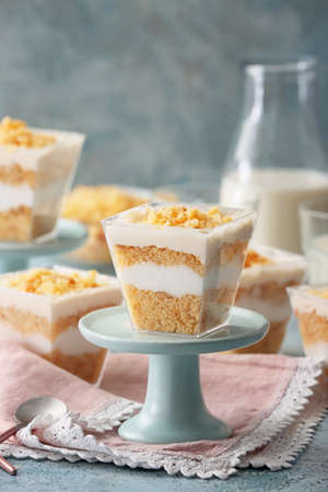 Delicious cupcake in jar on tableの写真素材