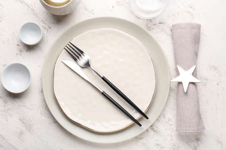 Beautiful table setting on light background