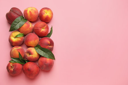 Many ripe peaches on color backgroundの写真素材