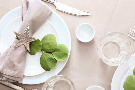 Beautiful table setting on light backgroundの写真素材