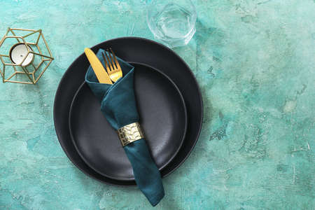 Beautiful table setting on color backgroundの写真素材