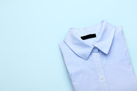 Stylish male shirt on color backgroundの写真素材