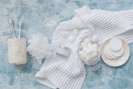 Set of bath accessories on color background