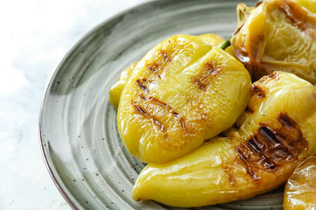 Plate with grilled bell pepper on light background closeupの写真素材
