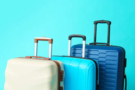 Packed suitcases on color background. Travel conceptの写真素材