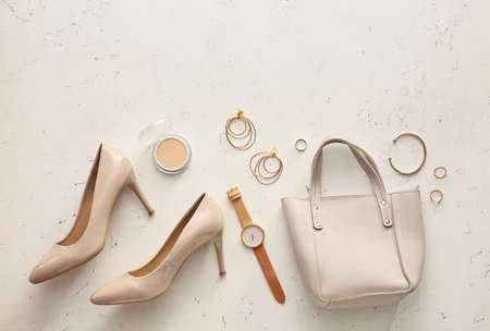 Stylish bag, accessories and shoes on color backgroundの写真素材