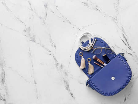 Stylish bag and accessories on light backgroundの写真素材