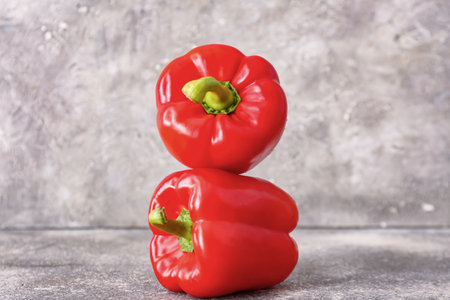 Red bell pepper on light backgroundの写真素材