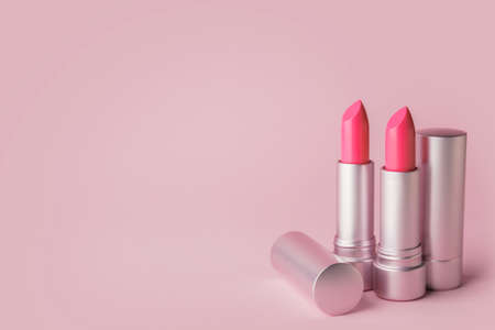 Different lipsticks on color backgroundの写真素材