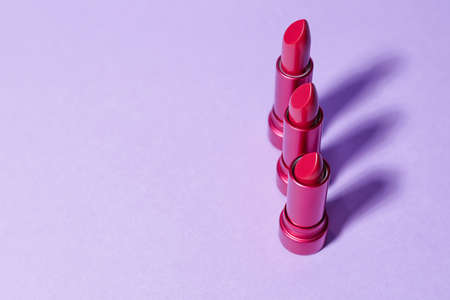 Different lipsticks on color backgroundの写真素材