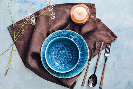 Beautiful table setting on color backgroundの写真素材