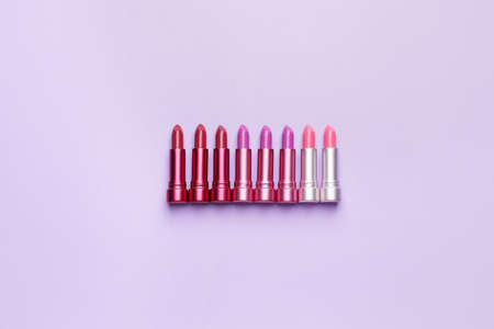 Different lipsticks on color backgroundの写真素材