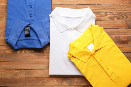 New male shirts on wooden backgroundの写真素材
