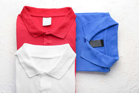 New male shirts on light backgroundの写真素材