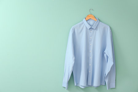 Stylish male shirt on color backgroundの写真素材