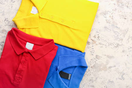 New male shirts on light background