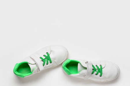 Child's shoes on white backgroundの写真素材