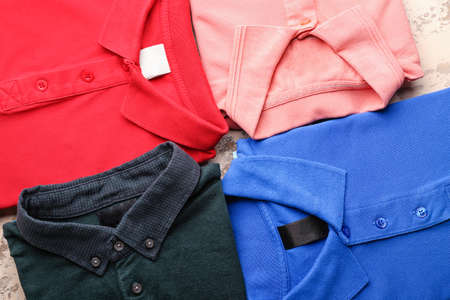 New male shirts on light background, closeupの写真素材